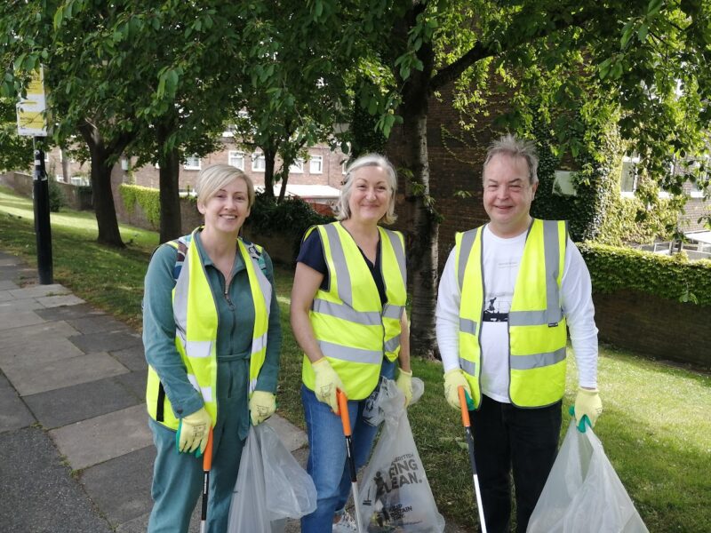 Sian Eiles with colleagues doing a litterpick