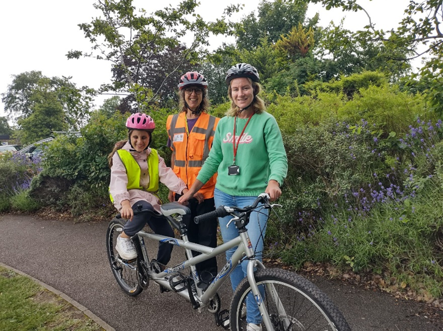 Mother and daughter embrace Bikeability on their tandem