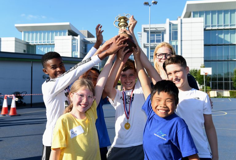 Children celebrating wining the Milton Keynes Bikeability Olympics