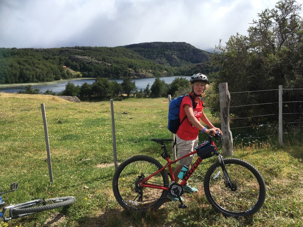 Jenny with her bike in the countryside