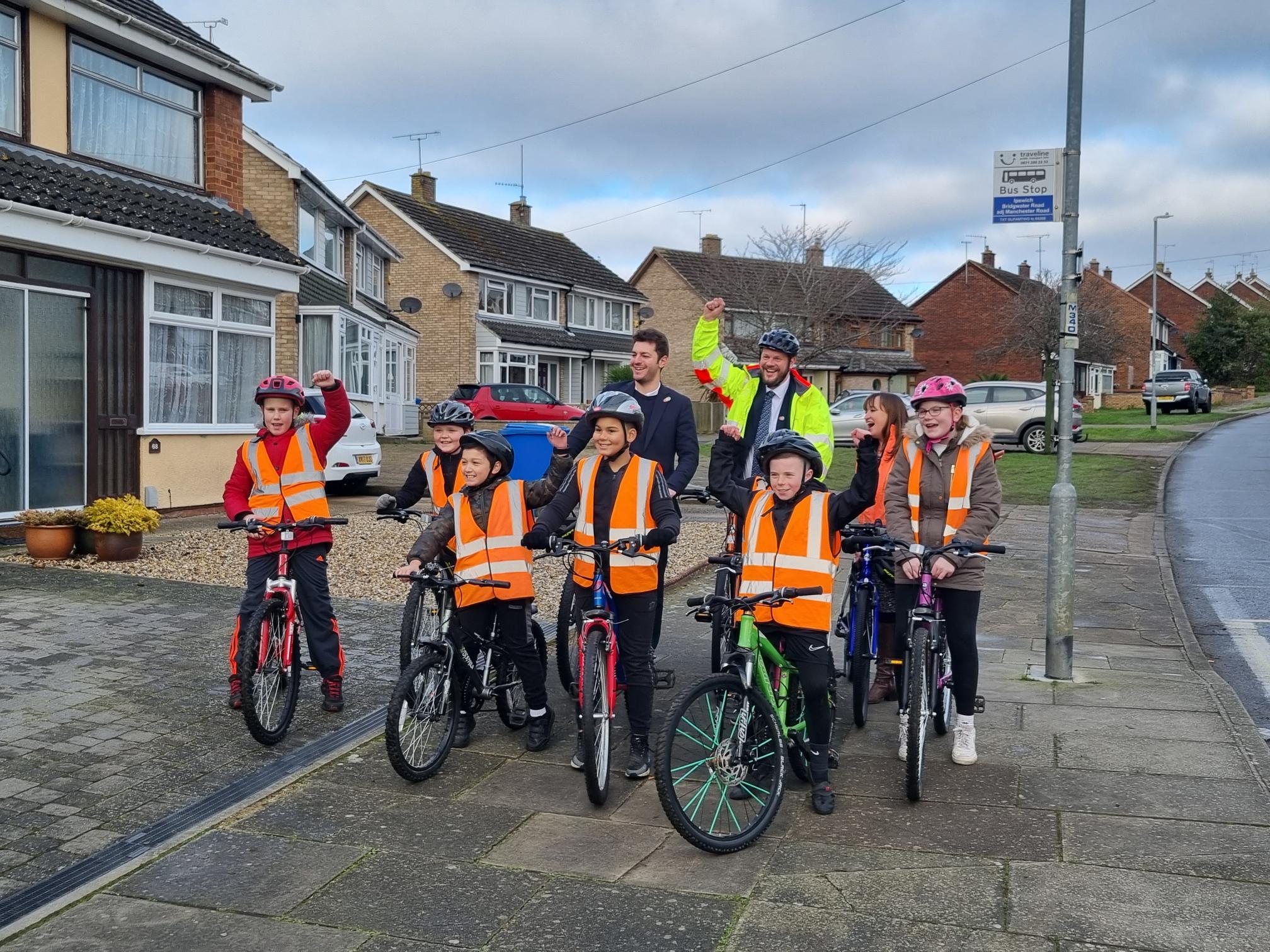 Minister Simon Lightwood, MP Jack Abbott and Bikeability CEO Emily Cherry with a group of Bikeability riders