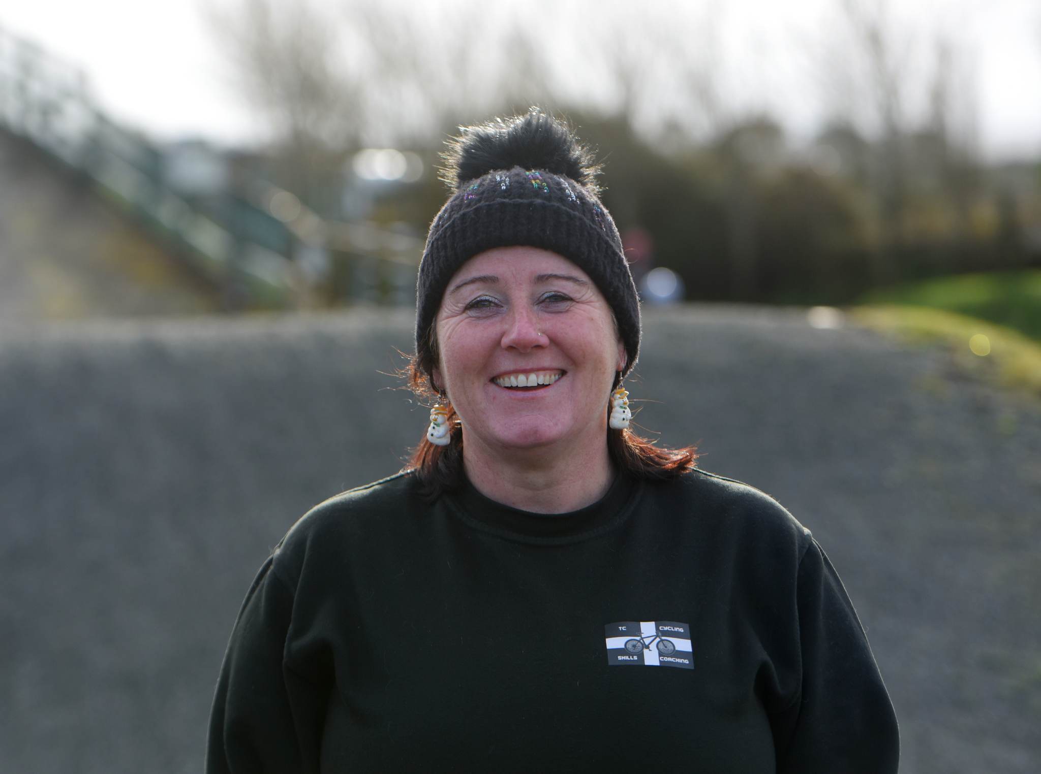 Tracey Clapton in a black bobble ha and jumper smiling