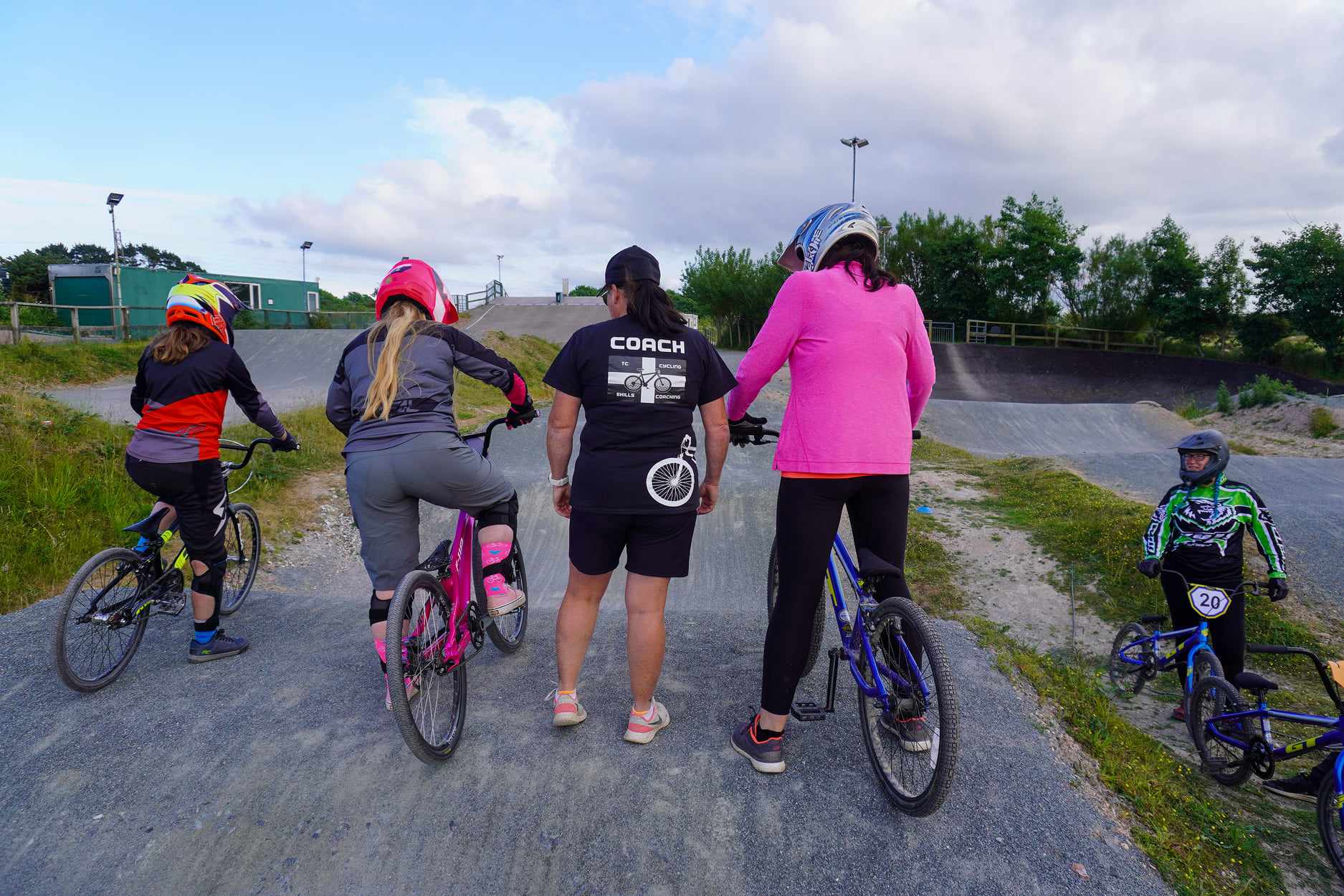 Tracey with some riders on a BMX track